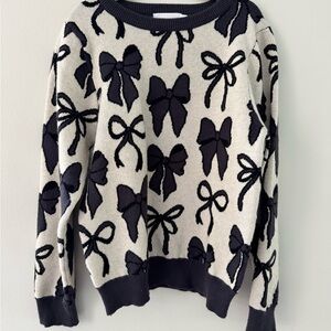 Girls Mila and Rose Cream & Black Bow Pattern Sweater